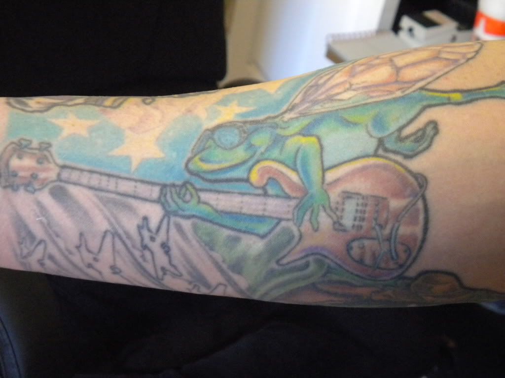 inner upper arm tattoo